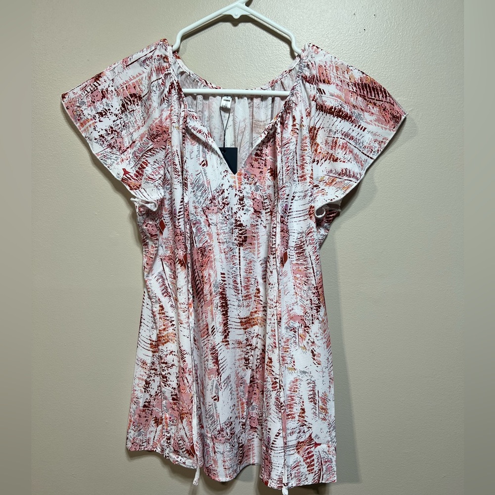 Women's size L top white with shades of pink designs